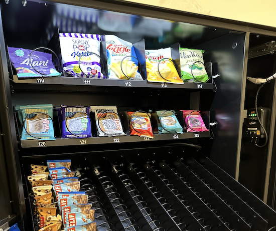 vending machine being stocked with healthier options